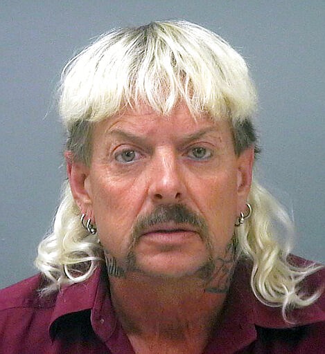 FILE - This file photo provided by the Santa Rosa County Jail in Milton, Fla., shows Joseph Maldonado-Passage, also known as &quot;Joe Exotic.&quot; Maldonado-Passage was convicted in an unsuccessful murder-for-hire plot against Carole Baskin, the founder of Big Cat Rescue, who he has repeatedly accused of killing her husband Jack &#147;Don&#148; Lewis. Lewis' unsolved 1997 disappearance and Maldonado-Passage's accusations are the subject of new Netflix series &#147;Tiger King.&#148; (Santa Rosa County Jail via AP, File)