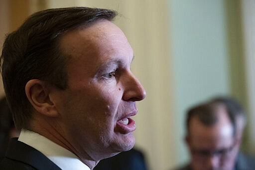 Sen. Chris Murphy, D-Conn., speaks about the coronavirus outbreak, after their policy luncheon, on Capitol Hill, Tuesday, March 10, 2020, in Washington. (AP Photo/Alex Brandon)