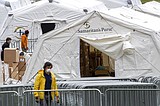 Help heads to NYC as experts predict over 100,000 US deaths