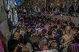 In packed, dirty cells, political prisoners fear virus