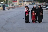 The Latest: Iraq extends nationwide curfew as tests ramp up