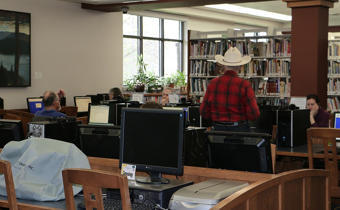 &#151;Photo by LYNNE HALEY
Between computer stations and book stacks, it&#146;s a tight squeeze at the library in Sandpoint.