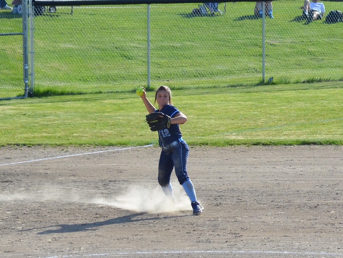 Photo by JULIE GOLDER
Jadyn Bennett throws the out at first from third on a Timberlake slap bunt Tuesday.