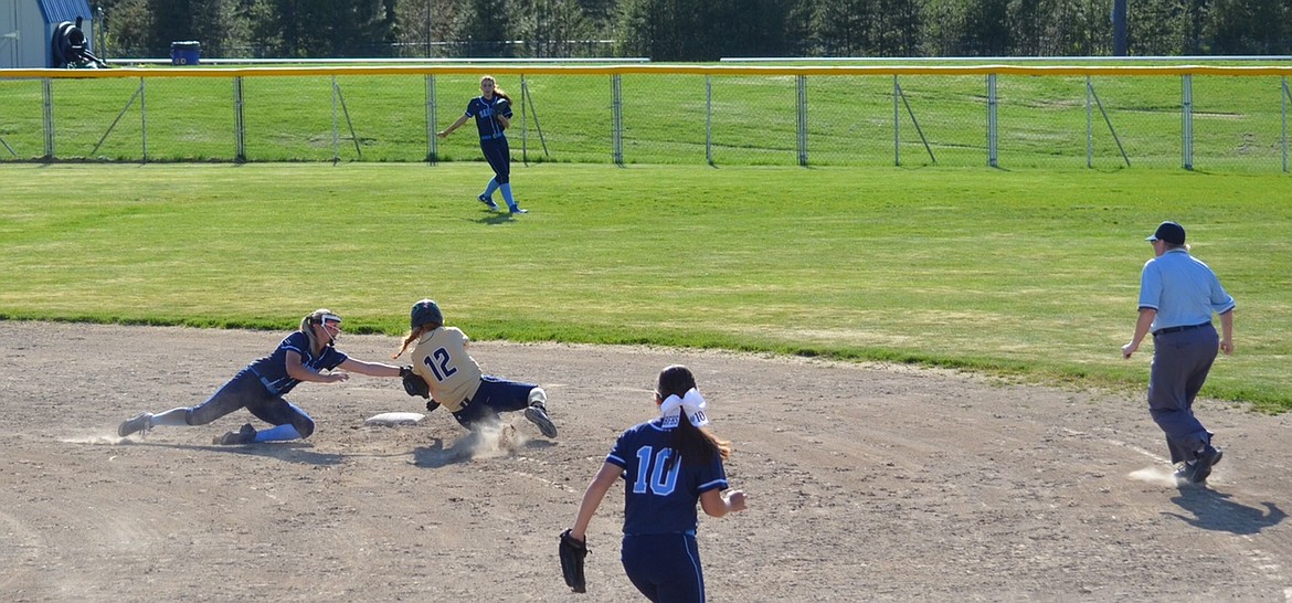 Photo by JULIE GOLDER
Badger Kassy Skeen tags a Timberlake player as she tries to steal second base.