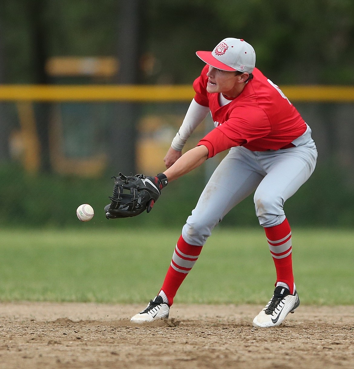 &#151;Photo by JASON DUCHOW PHOTOGRAPHY
Sandpoint second baseman Caleb Edlund makes a slick defensive move by flipping the ball out of his glove to shortstop Davan Norris for the force out.