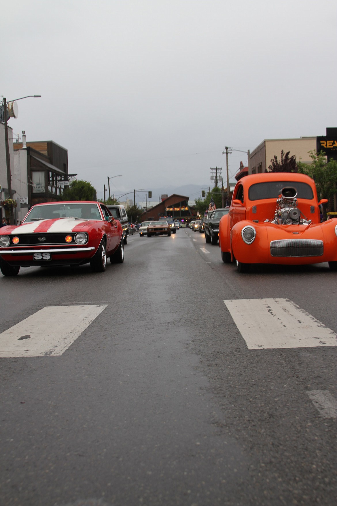 Detroit muscle makes its way down Cedar Street during the Lost in the 50s parade on Friday.