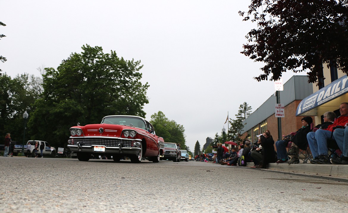 &#151;Photo by CAROLINE LOBSINGER
Classic cars make their way down Church Street during Friday&#146;s Lost in the &#145;50s parade.