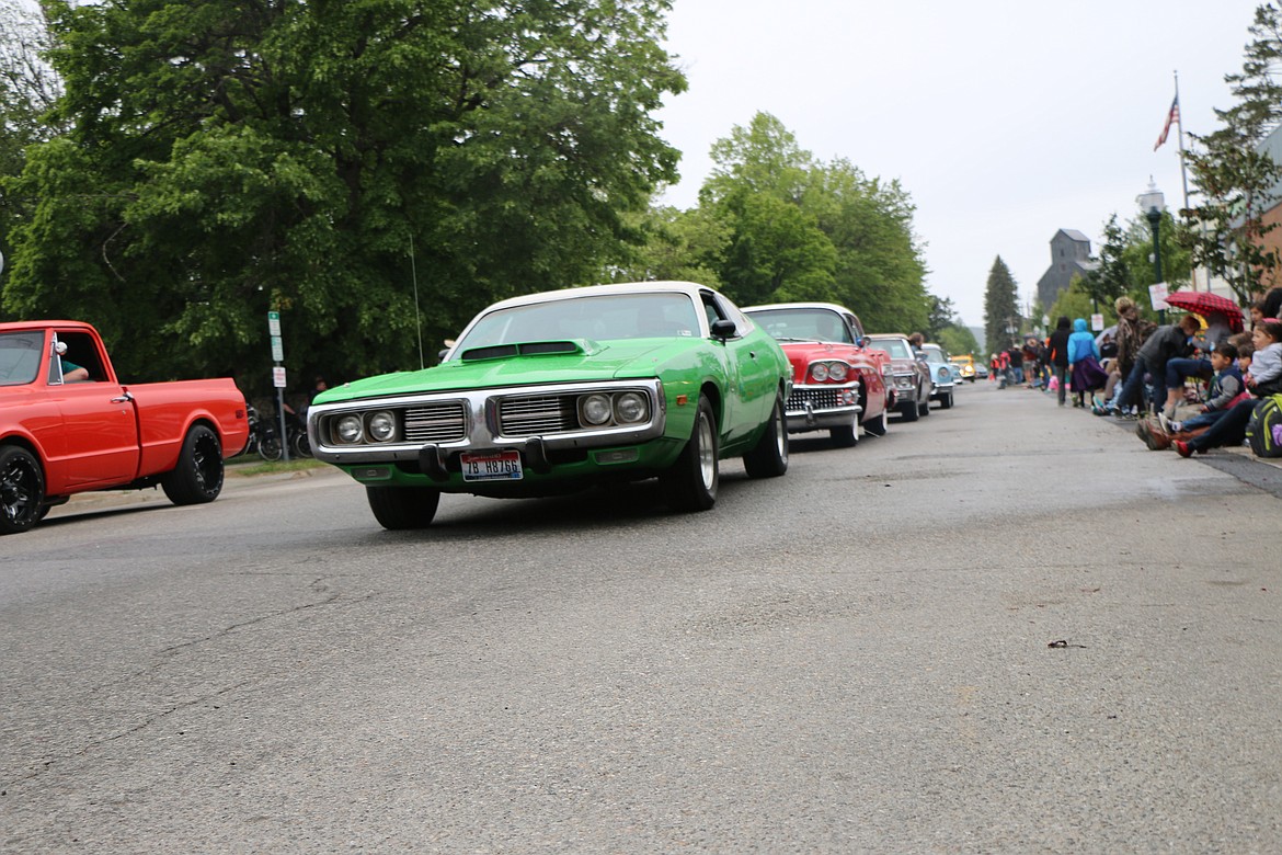 &#151;Photo by CAROLINE LOBSINGER
Classic cars make their way down Church Street during Friday&#146;s Lost in the &#145;50s parade.