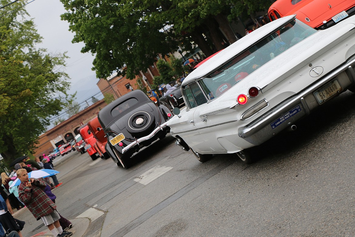 &#151;Photo by CAROLINE LOBSINGERClassic cars make their way down Church Street during Friday&#146;s Lost in the &#145;50s parade.