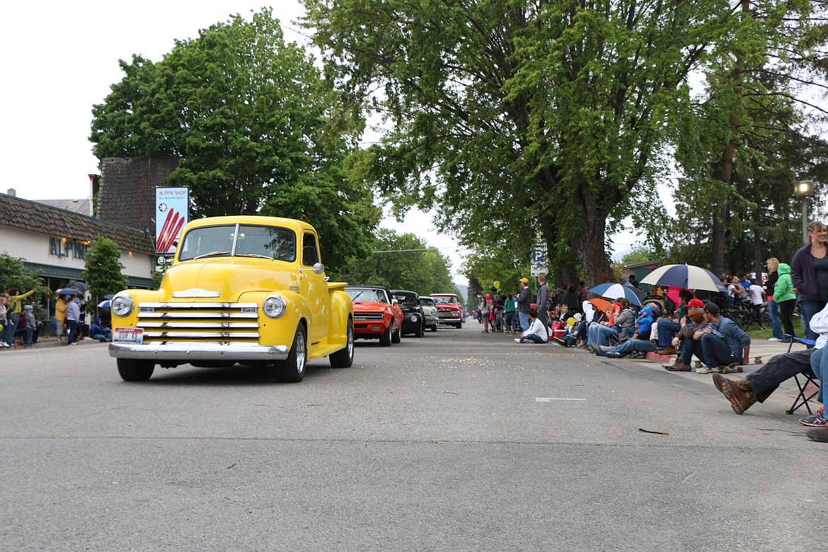 &#151;Photo by CAROLINE LOBSINGER
Classic cars make their way down Church Street during Friday&#146;s Lost in the &#145;50s parade.