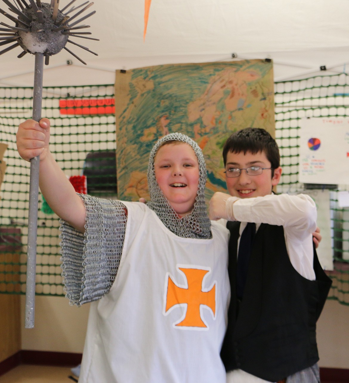 -- Photo by LYNNE HALEY

Josh, left, and Gabe, right, fifth-graders at Forrest M. Bird Charter School, told tales of Jerusalem and Ireland at the recent World's Fair.