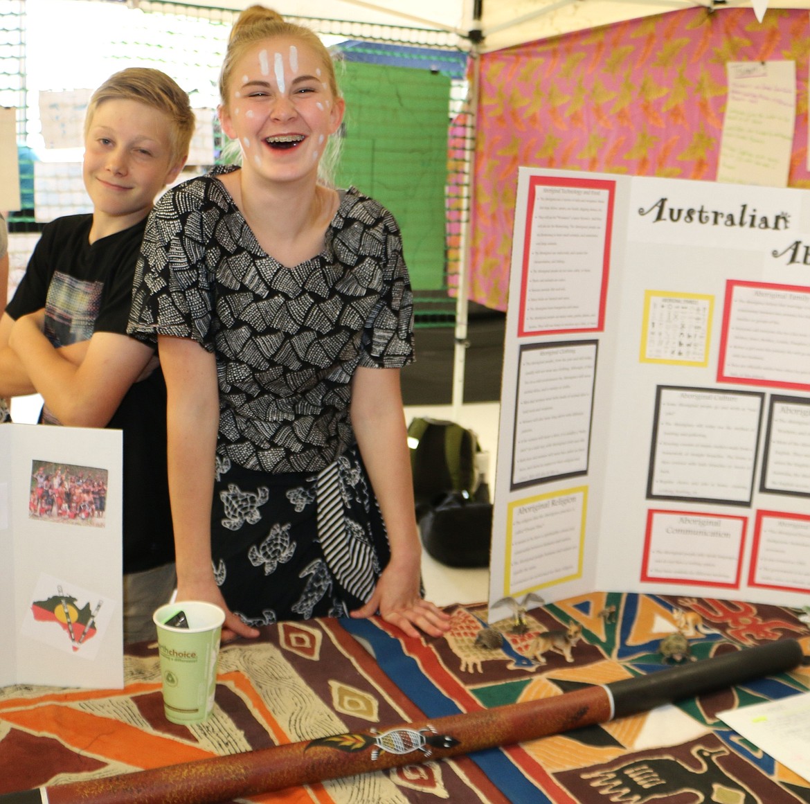 -- Photo by LYNNE HALEY

Julia C., right, a student at Forrest M. Bird Middle School,  created a display about Australian aborigines. A classmate stands in the background.