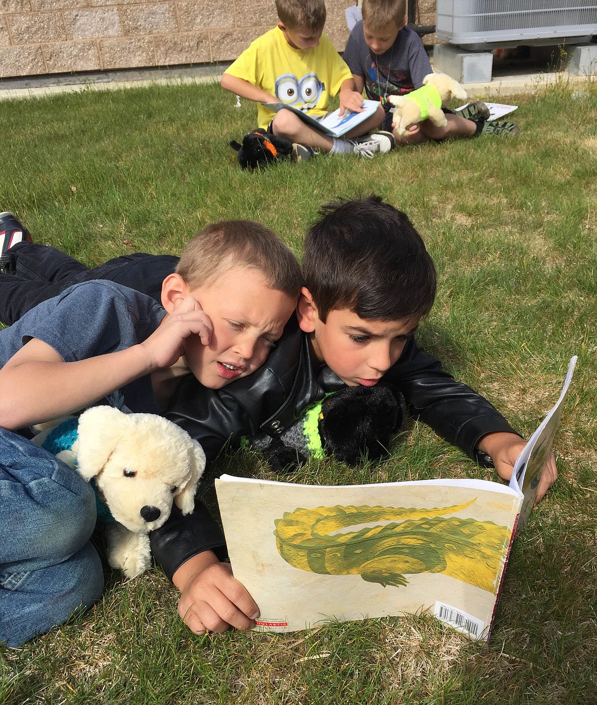 &shy;&#151;Photo courtesy KYLA FRENCH
\Kootenai Elementary first-graders Gage Nelson, left, and Adrian Hunter, right, enjoy some reading buddy time.