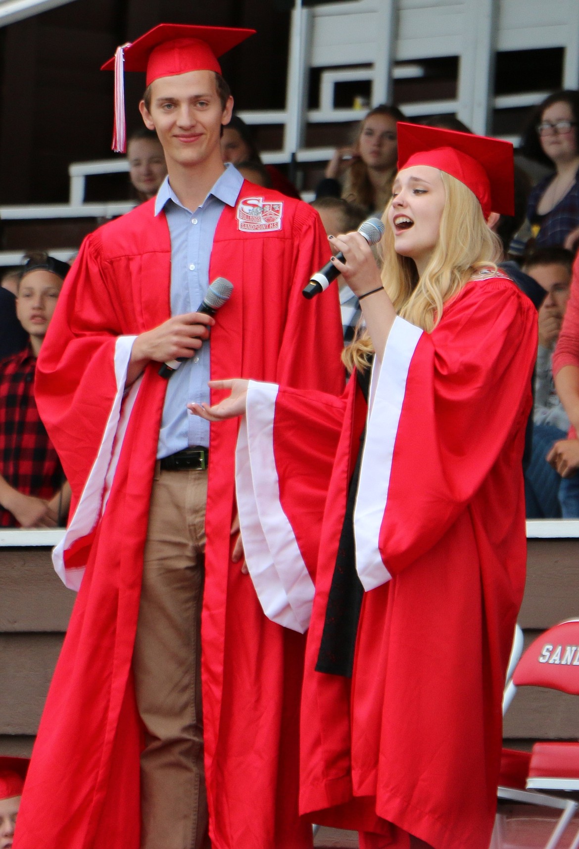 -- Photo by LYNNE HALEY

Greg Marks, left, and Lily Weishaar, right, along with the SHS Chamber Choir, sing &quot;I've Had the Time of My Life.&quot;