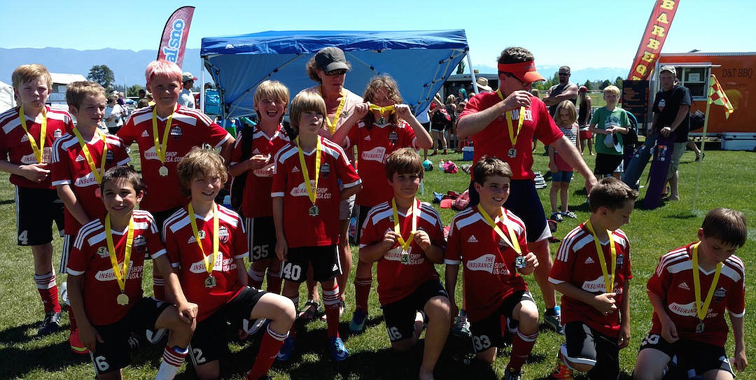 &#151;Courtesy photo
The Strikers U10 boys won the Silver medal for their age group at 3 Blind Refs soccer tournament in Kalispell to cap the spring club season. Pictured kneeling, from left to right: Klein Fragoso, Ethan Barcklay, Max Zuberbuhler, Henry Barnes, Wyatt Fournier and Nathan Pugh. Standing: Crosby Schmidt, Ayden Huppert, Kaidyn Randolph, Blue Mountain Argue, Kildy Pogue Zingarelli, coach Diana Gore, Avery Smart and coach Hal Schmidt.