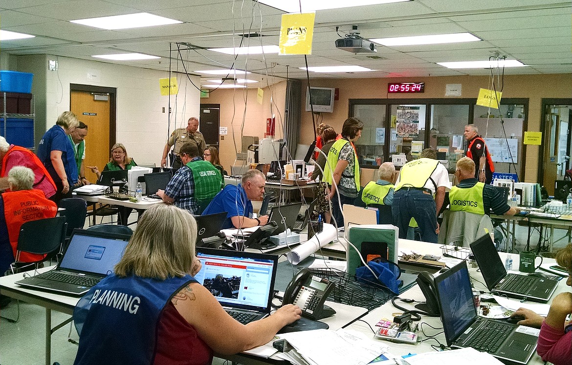 BRIAN WALKER/Press
The emergency operations center at the Kootenai County Sheriff's Office is divided into several specialty cells, including management, public information, planning, logistics and legal services.