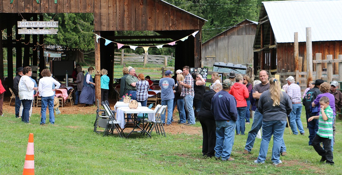 -- Photo by LYNNE HALEY

Members of the Albertson family greet guests at their centennial celebration.