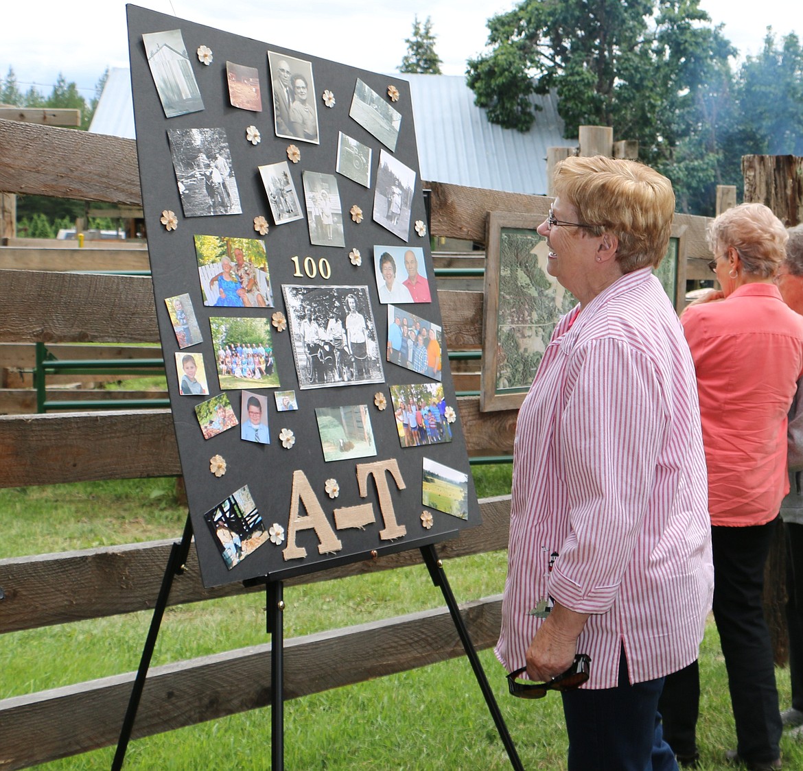 &#151;Photo by LYNNE HALEY
Guest look over the displays at the Century Ranch celebration marking A-T Ranch&#146;s 100th year.