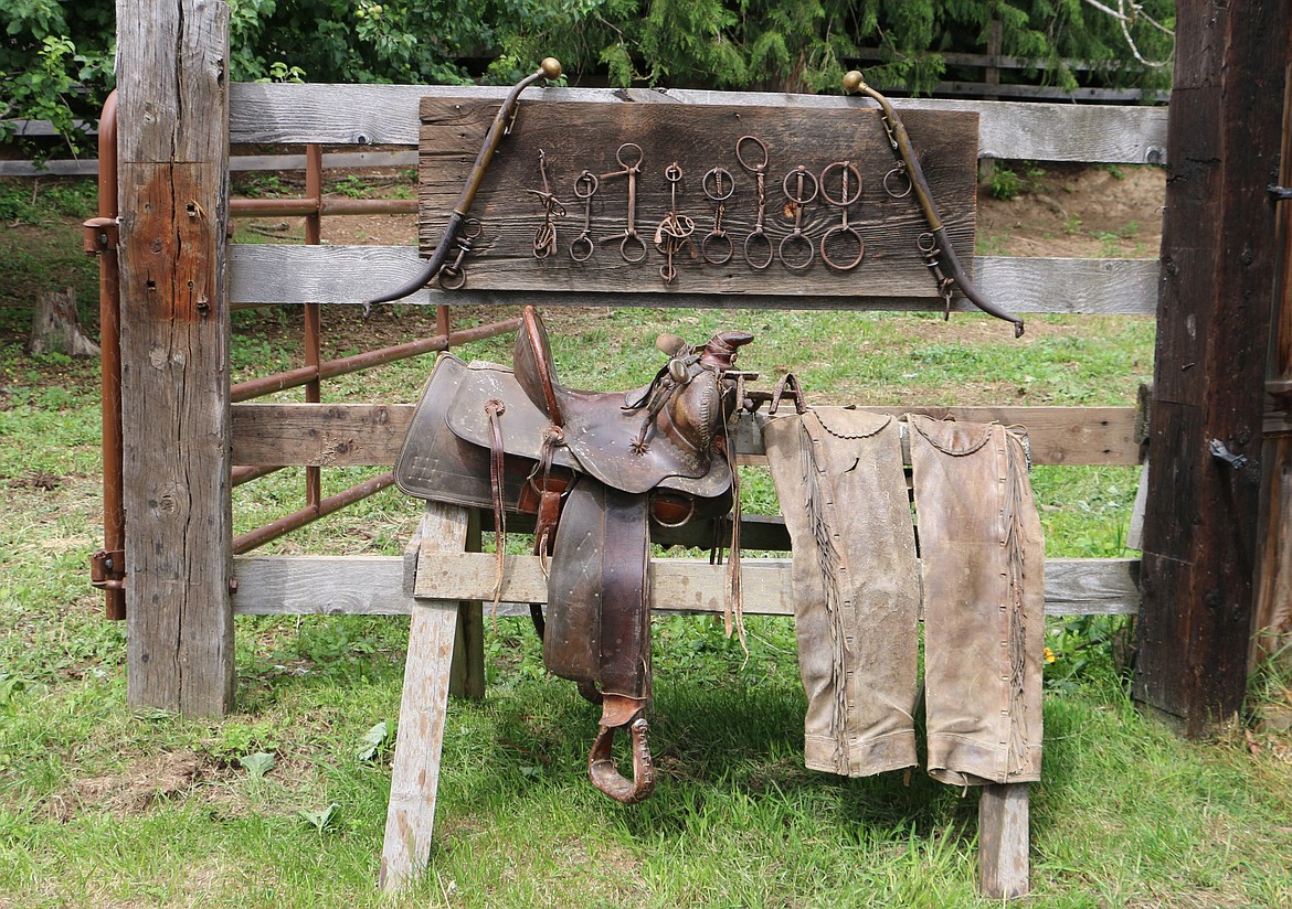 &#151;Photo by LYNNE HALEY
Some of the original gear patriarch Bill Albertson used in the early years of A-T Ranch. Hitching equipment for teams of work horses is shown at the top, while Bill&#146;s saddle and chaps are displayed below.