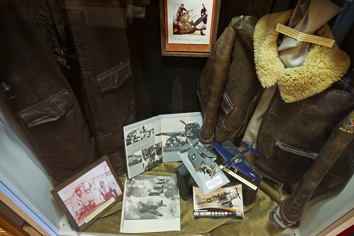 A leather U.S. Army Air Force jacket hangs in a gallery among other mementos at the Pappy Boyington Veterans Museum on Tuesday.