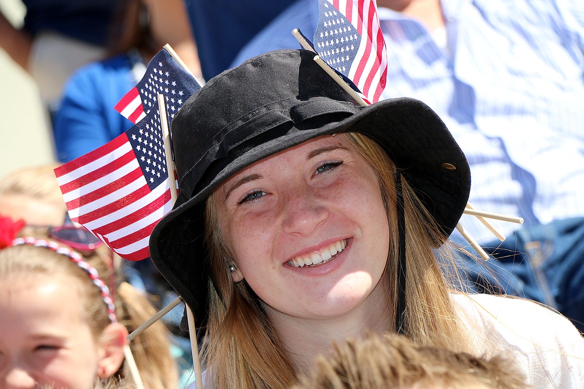 &#151;Photo by CAROLINE LOBSINGER
Flags were the accessories of choice on Monday as evidenced by this parade-goer waiting for the start of the Sandpoint Lions&#146; Grand Parade on the Fourth of July.