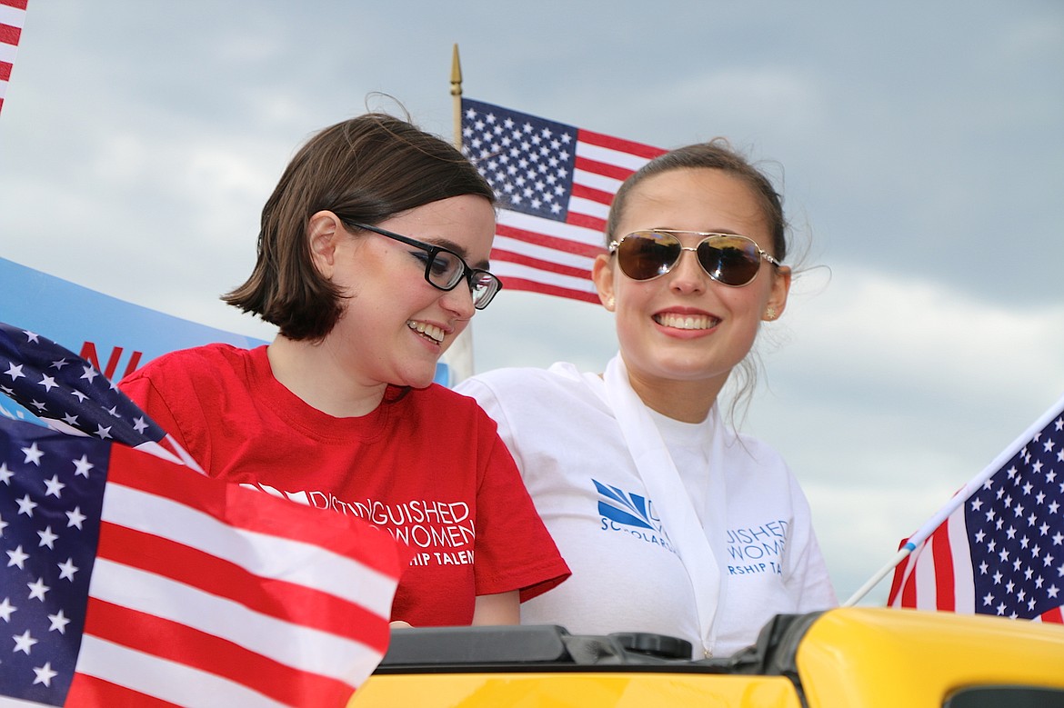 &#151;Photo by CAROLINE LOBSINGER
Distinguished Young Women participants ride in the Sandpoint Lions' Grand Parade on the Fourth of July Monday.