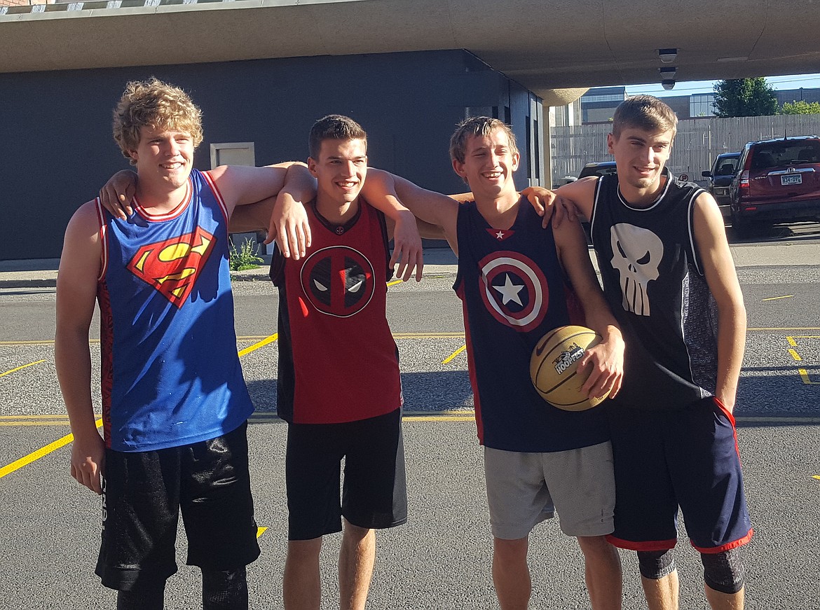 &#151;Courtesy photo
White and Skinny, made up of Kootenai Thunder playeres, went 2 and 2 at Hoopfest. From left to right are Shepley Osman, Peter Soderberg, Bucky Roop, and Andrew McArthur.