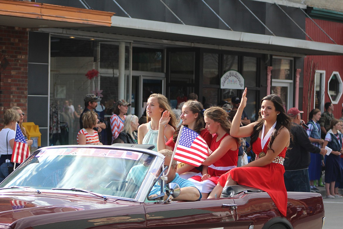 Photo by DON COGGER
The ladies of the Distinguished Young Women program enjoy a ride down Main St. during Monday&#146;s 4th of July parade.