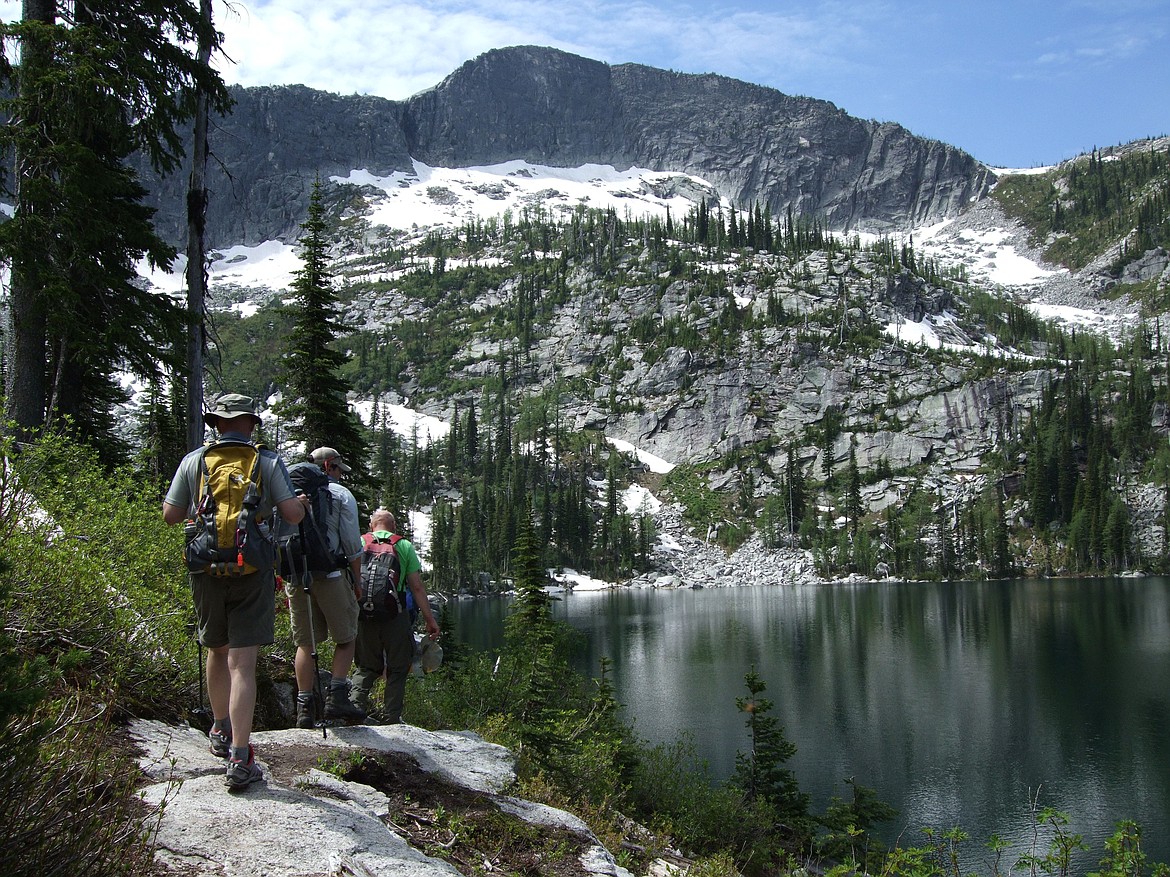 &#151;Photo courtesy NANCY DOOLEY/Idaho Conservation League
A group of hikers enjoys a summer adventure at Roman Nose Lake.