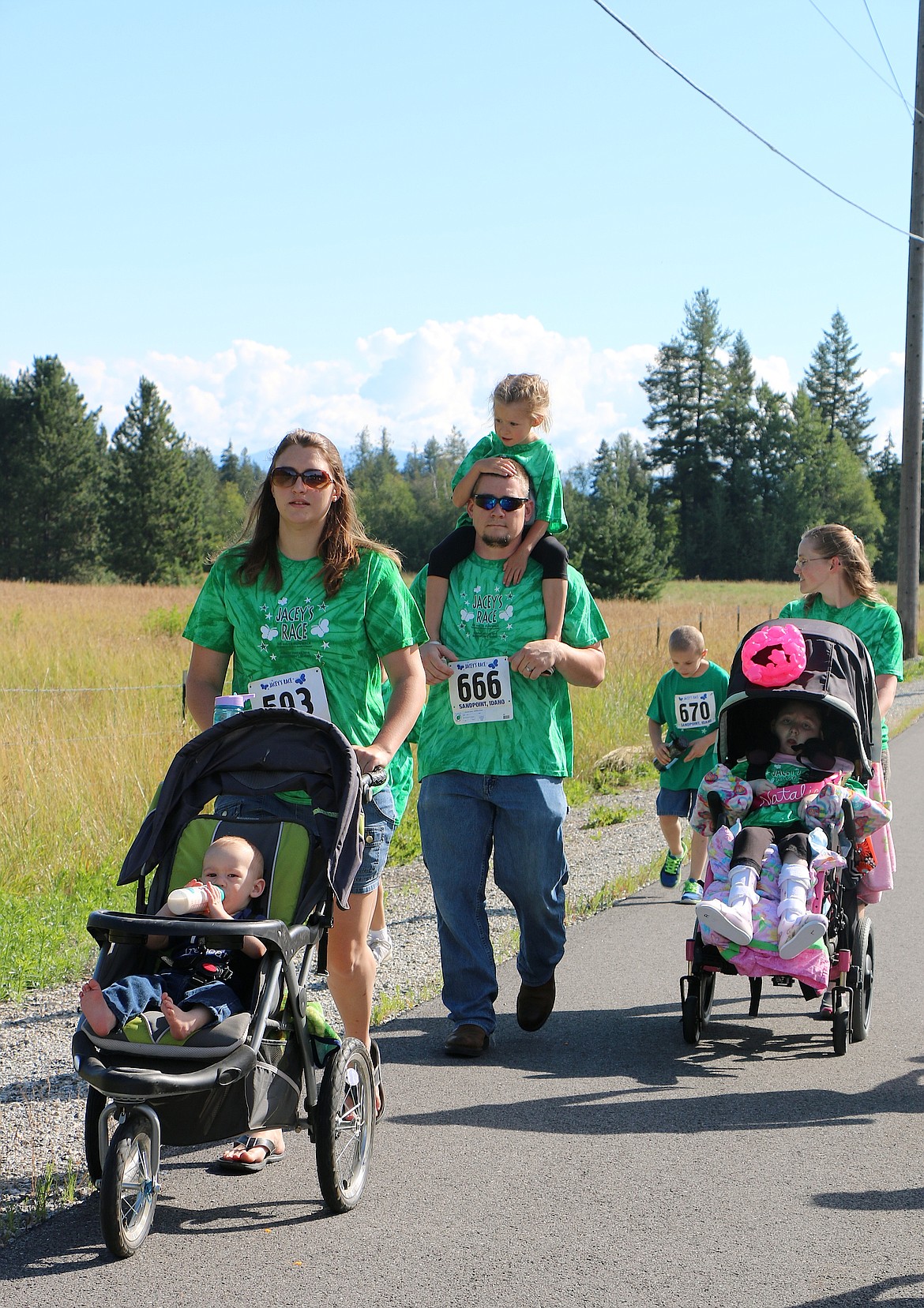 &#151;Photo by CAROLINE LOBSINGER
Natalie Rachels, one of the four Jacey&#146;s Race beneficiaries, and her family take part in the annual event Sunday.