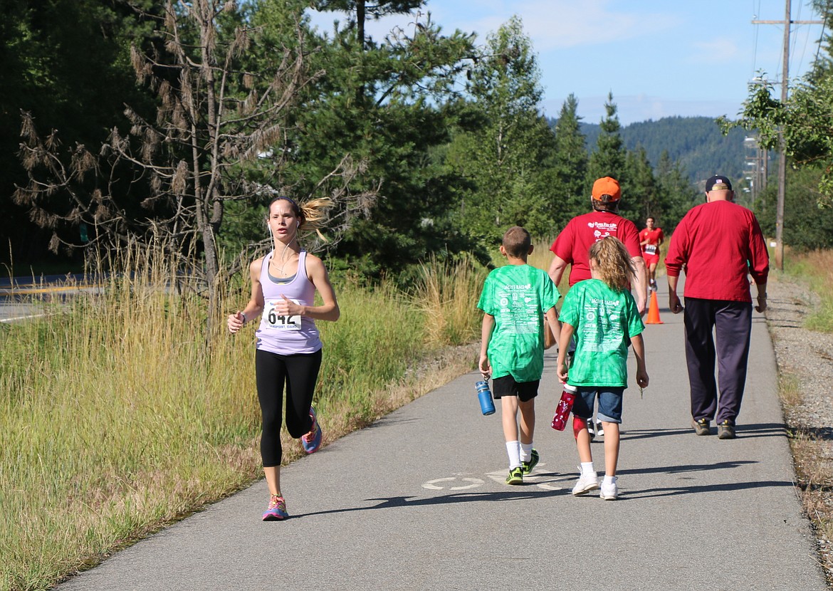 &#151;Photo by CAROLINE LOBSINGER
A runner takes part in Jacey's Race on Sunday.