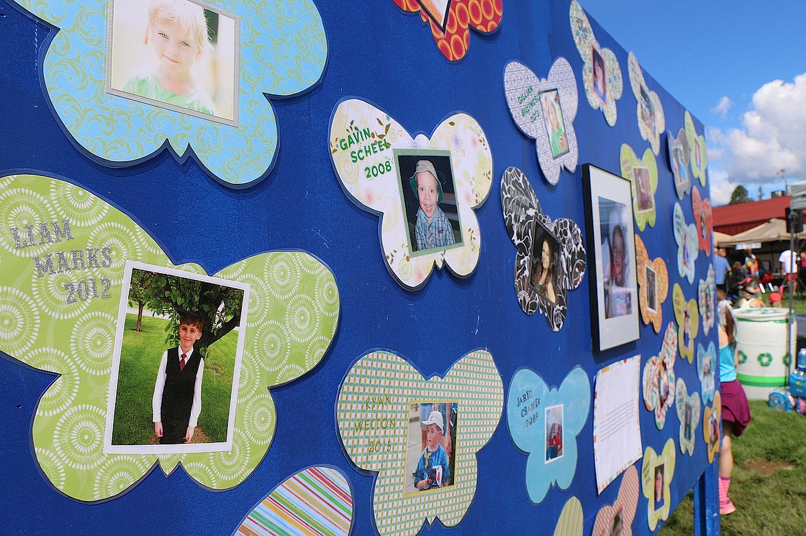 &#151;Photo by CAROLINE LOBSINGER
Past and current beneficiaries are honored at Jacey's Race on Sunday.