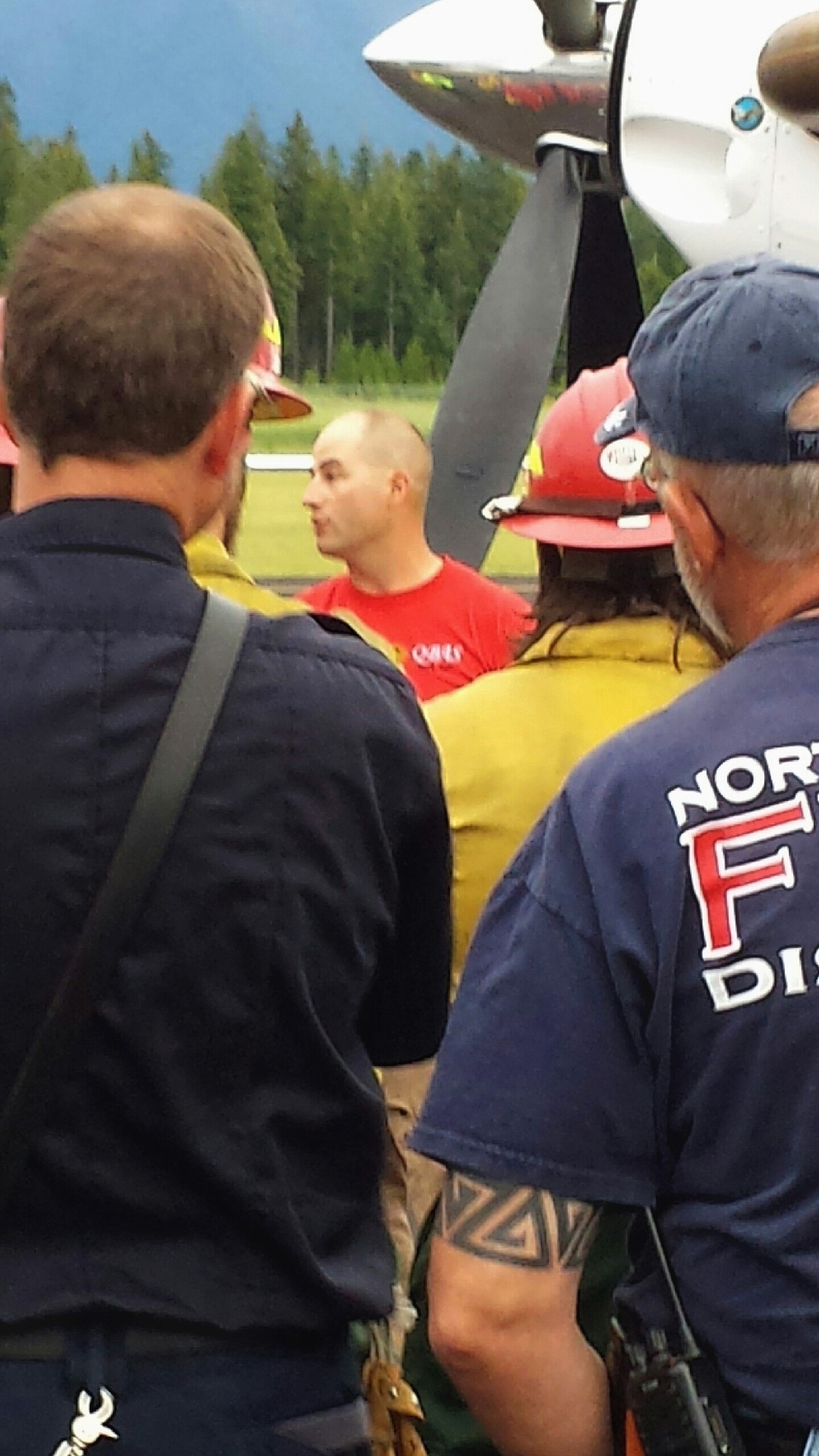 Courtesy photo: Mark Eliot

Pilot, Richard Spaulding addressing the group.