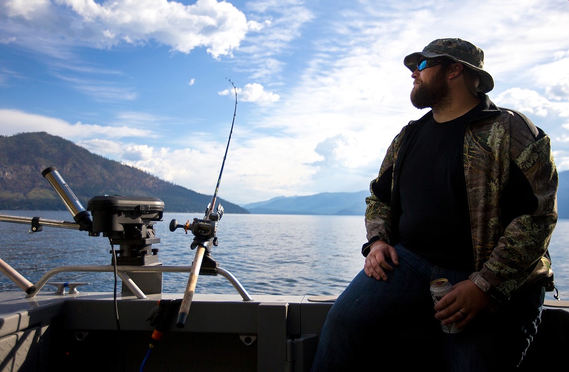 JAKE PARRISH/PressRyan Rogers, an Idaho Army National Guard veteran who served in Iraq, looks out over Lake Pend Orielle during a fishing trip on Friday.