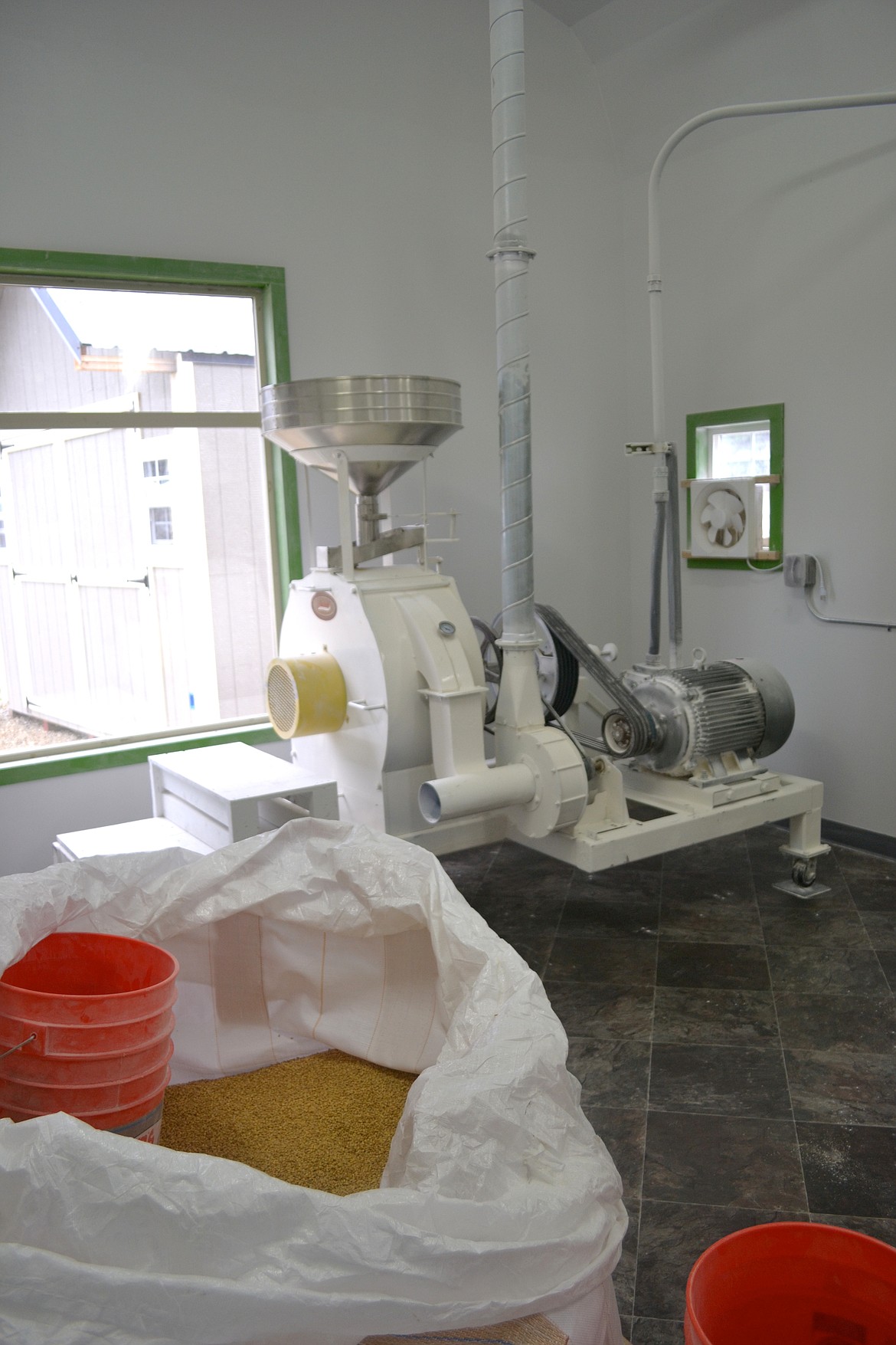 &#151;Photo by SARAH JENKINS
Farm to Market mill showing grain ready to be milled.