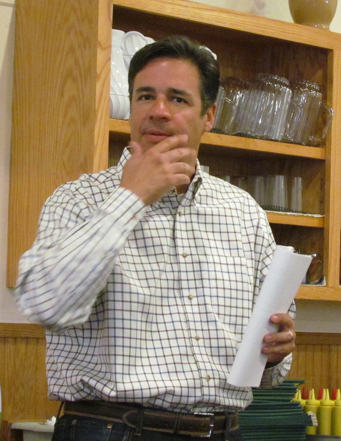 -- Photo by LYNNE HALEY

Congressman Raul Labrador thinks over a response to a constituent's question at Tuesday's meeting.