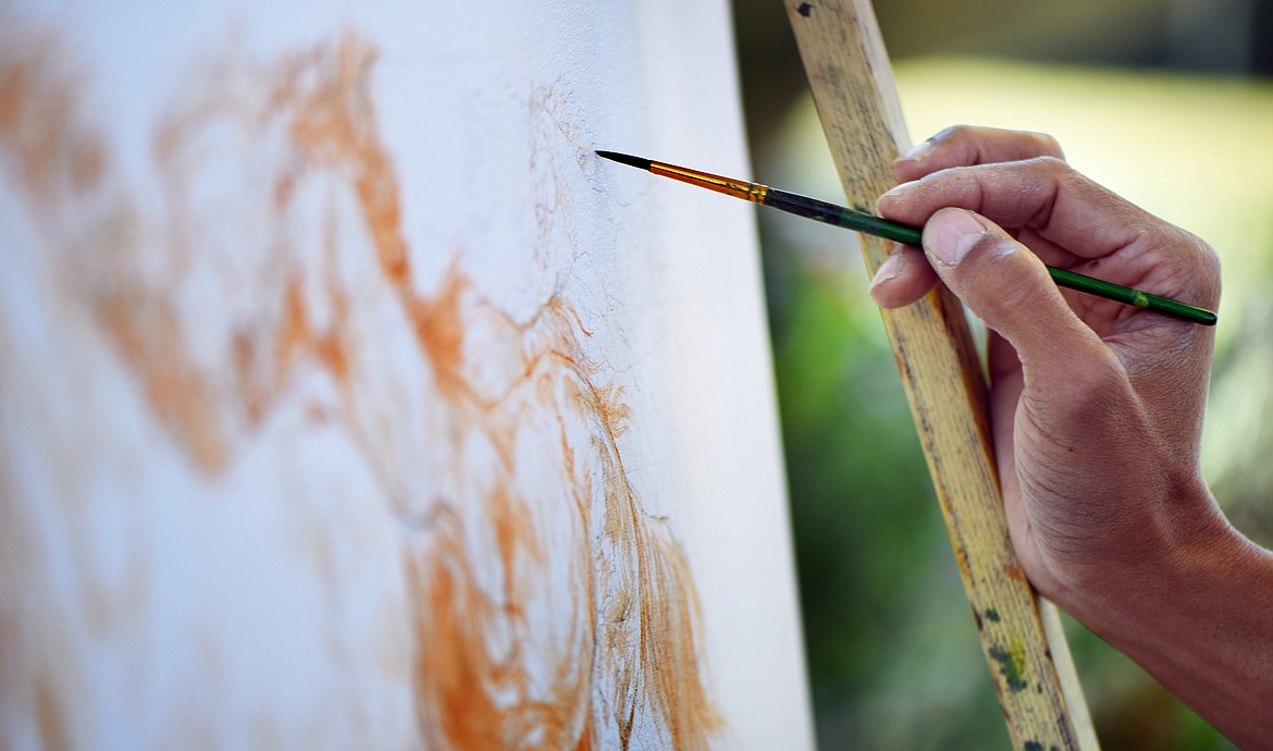 Detail of Sarawut Kanpairee painting outside the Sunti World Art Gallery on Thursday, August 11, in Whitefish.(Brenda Ahearn/Daily Inter Lake)