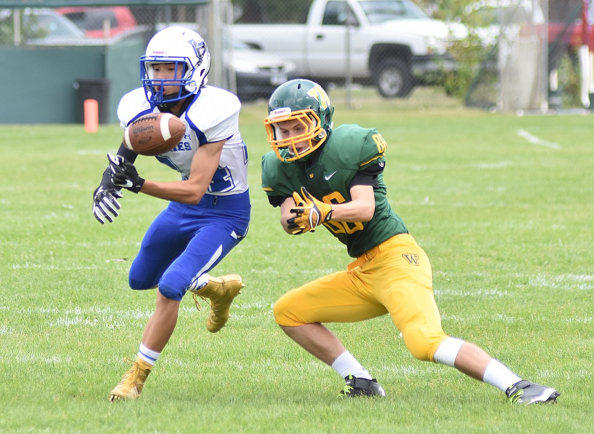 Whitefish defensive back Brendyn Peacoc breaks up a pass Saturday in a nonconfernce game against Havre at Memorial Field.