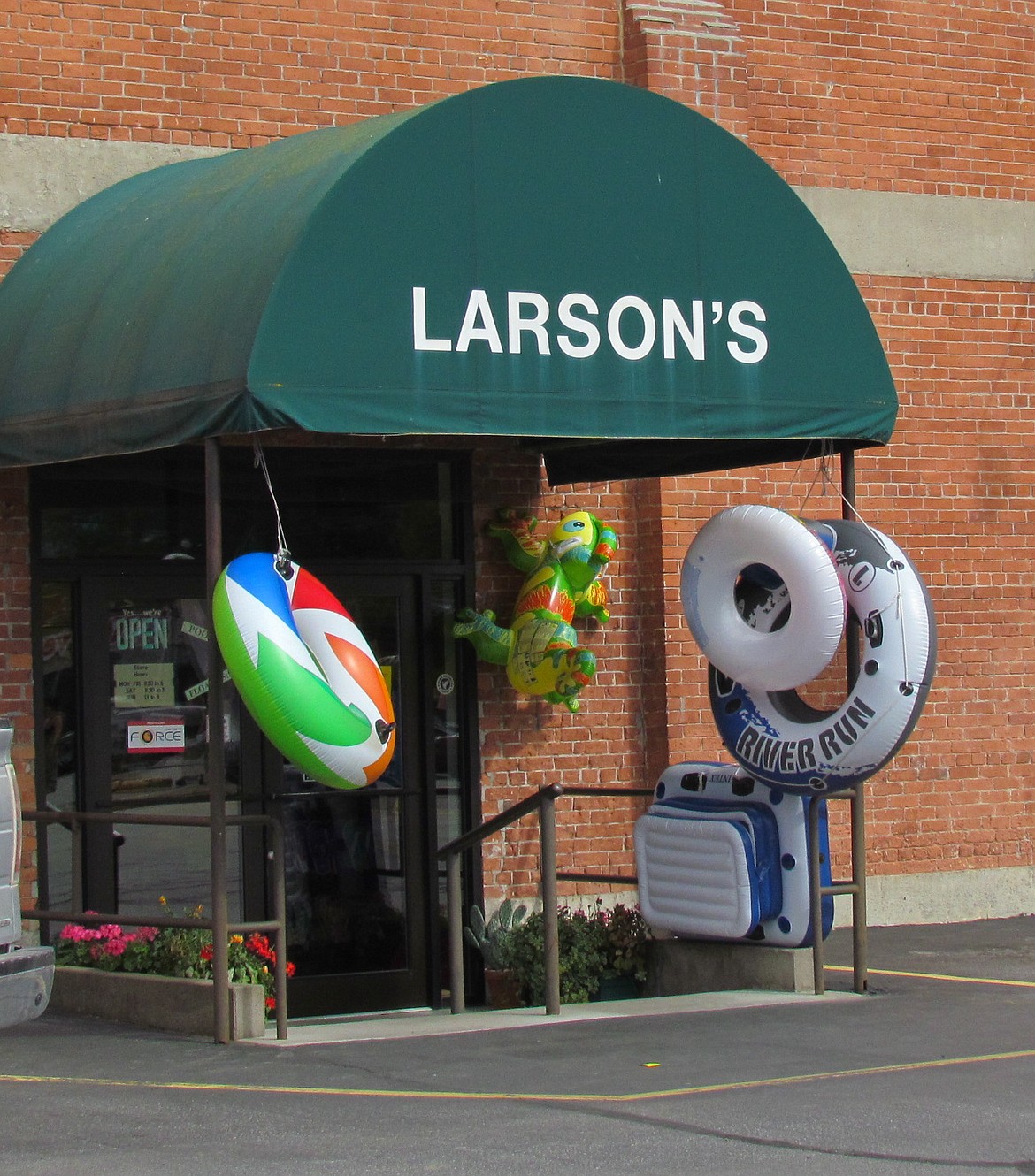 -- Photo by LYNNE HALEY


Brightly colored float toys entice visitors to come inside, where work clothes, shoes, hats, sportswear, toys and more await. Staff members specialize in friendly smiles and finding the right products for each customer.