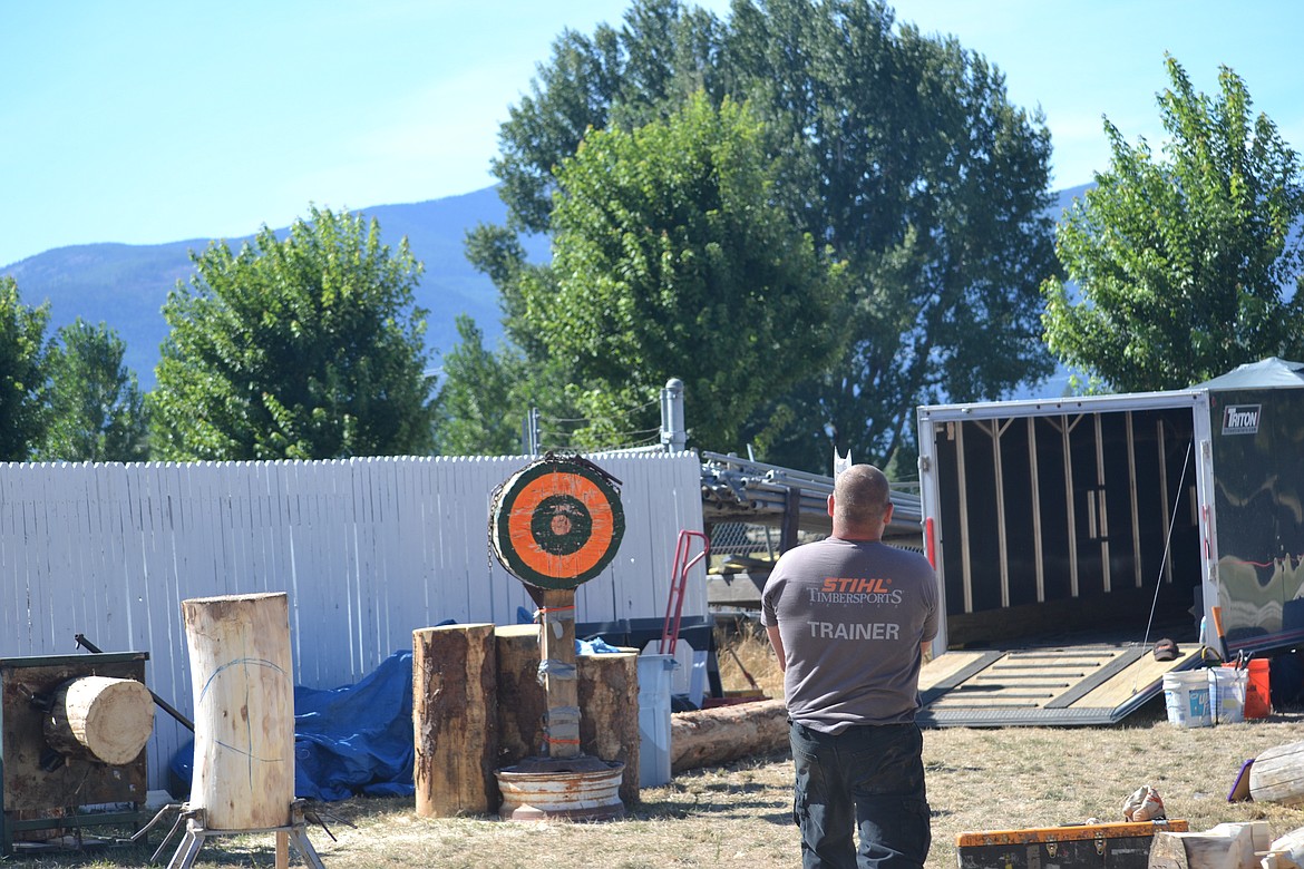 Photo by SARAH JENKINS

Idaho Forest Lumberjack show -- lining up the target for the ax throwing.