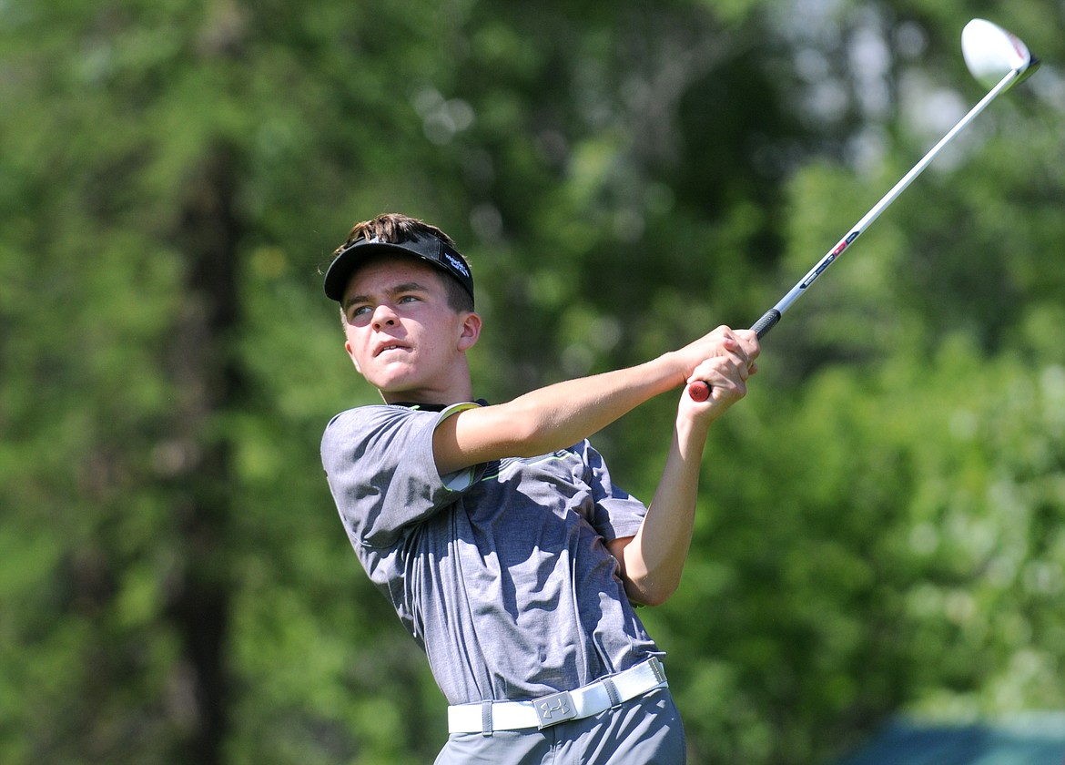 Aaric Bryan/Daily Inter Lake
Whitefish golfer Brendan Buls drives on the 14th tee of the North Course at Whitefish Lake Golf Club during the Northwest A Kickoff on Wednesday.