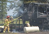 Fifth wheel trailer destroyed by fire near airport