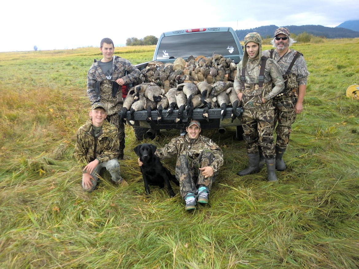 &#151;Photo courtesy IDAHO DEPARTMENT OF FISH AND GAME
Young hunters and their mentors display the waterfowl they got during a recent mentored waterfowl hunt offered by Idaho Department of Fish and Game. This year's hunt, which is planned for Sept. 24, is open to youth between the ages of 10-15.