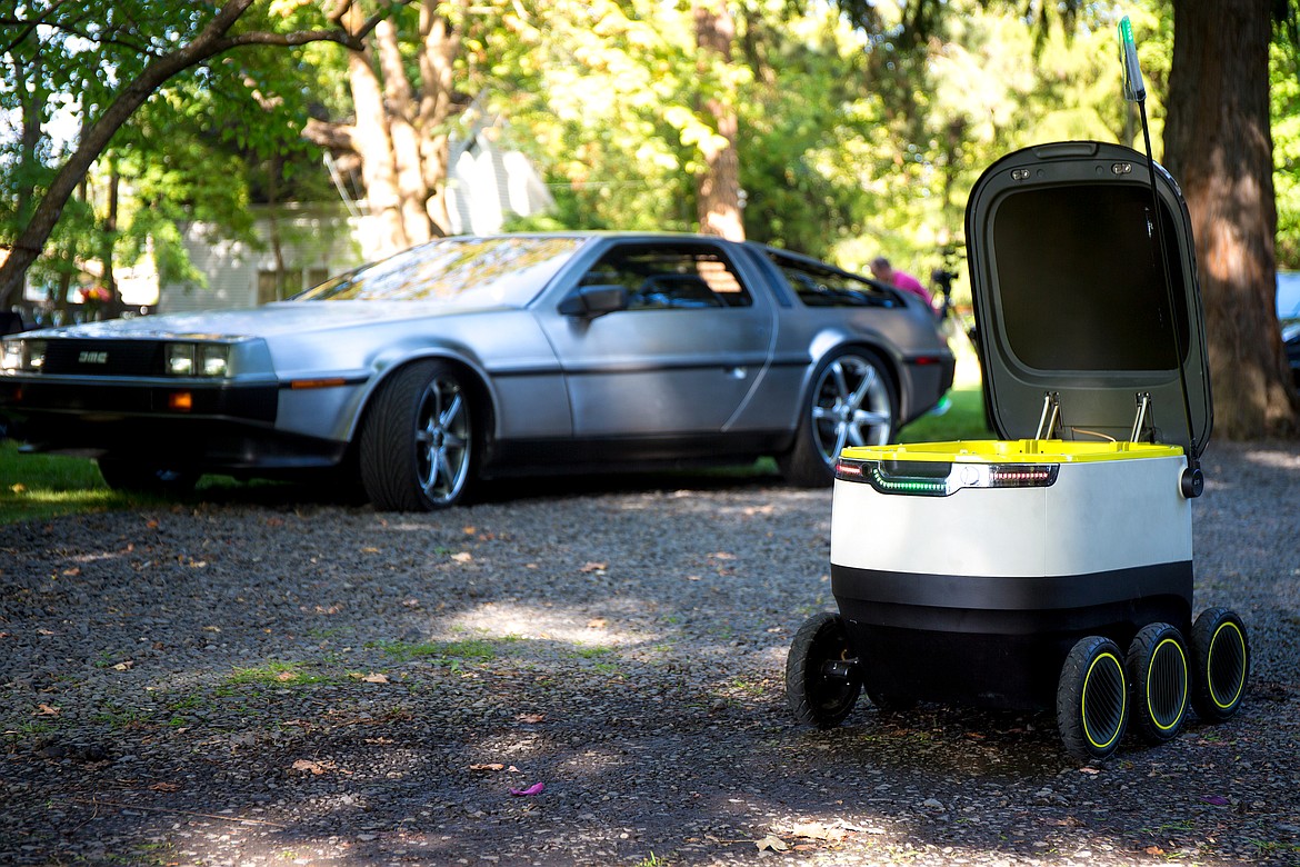 JAKE PARRISH/PressThe Starship Technologies Delivery Robot is parked with its cargo container open on Friday. The six-wheeled, 35-pound autonomous robot carries up to 20 pounds of cargo and uses multiple cameras and sensors to navigate urban areas to deliver goods to customers.