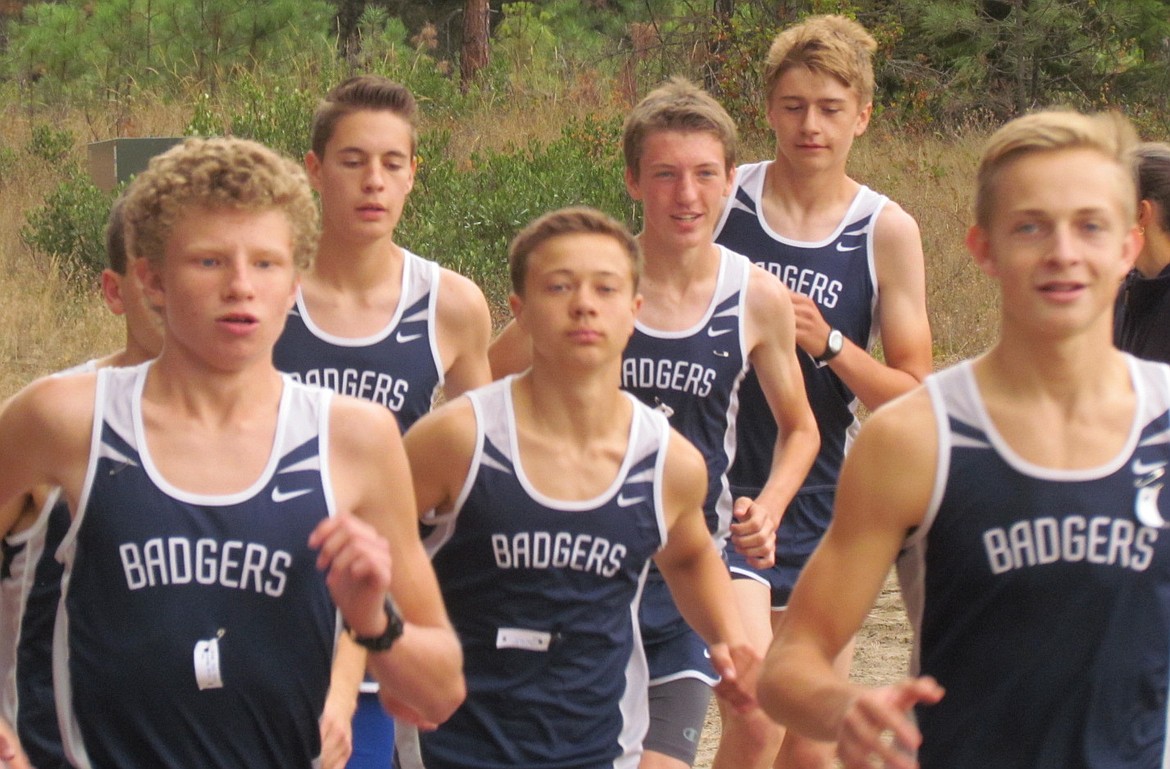 &#151; Photo by LYNNE HALEY
The varsity boys&#146; team heads out on the 5k course at the Naples cross country meet.