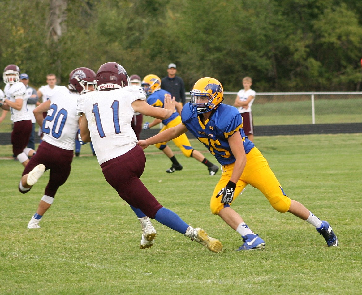 &#151;Photo by ERIC PLUMMER
Clark Fork&#146;s Jensen Heisel comes up to make a tackle as the Wampus Cats fell to the Mountain Cats in nonleague action.