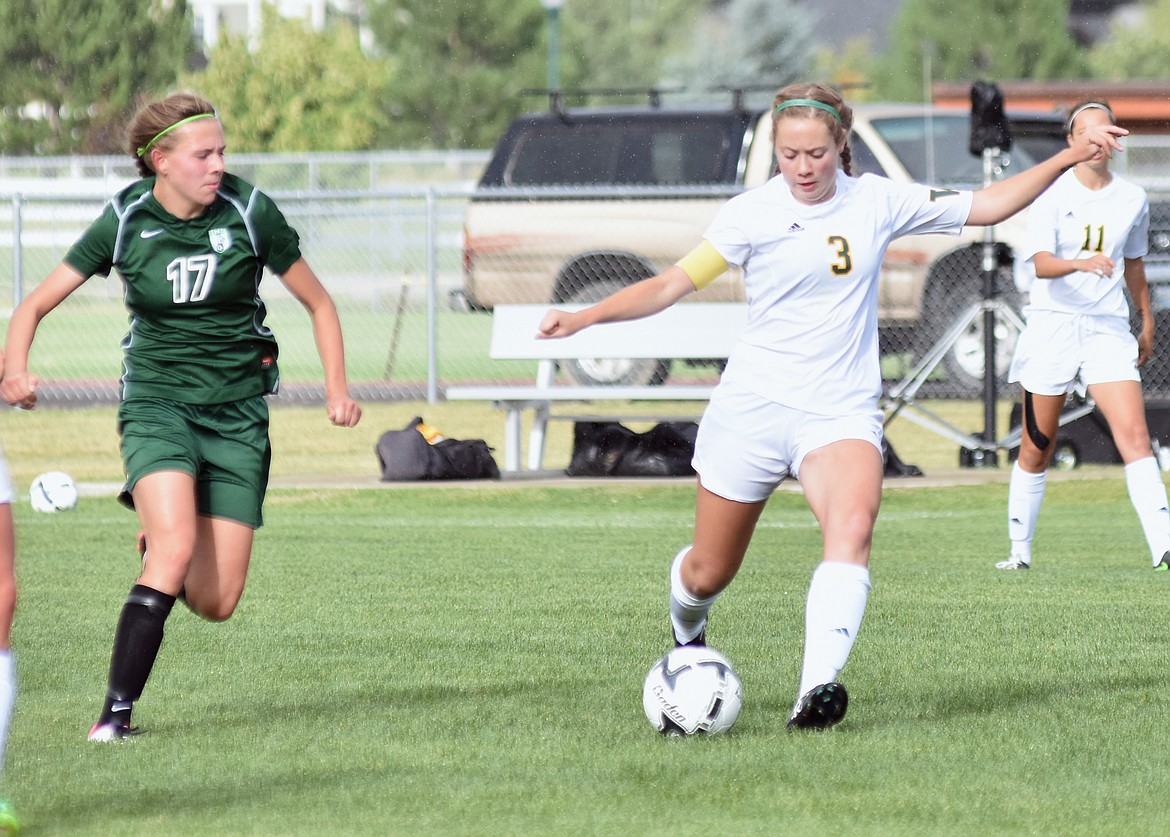 Senior Haley Nicholson lines up a shot Friday against Belgrade.