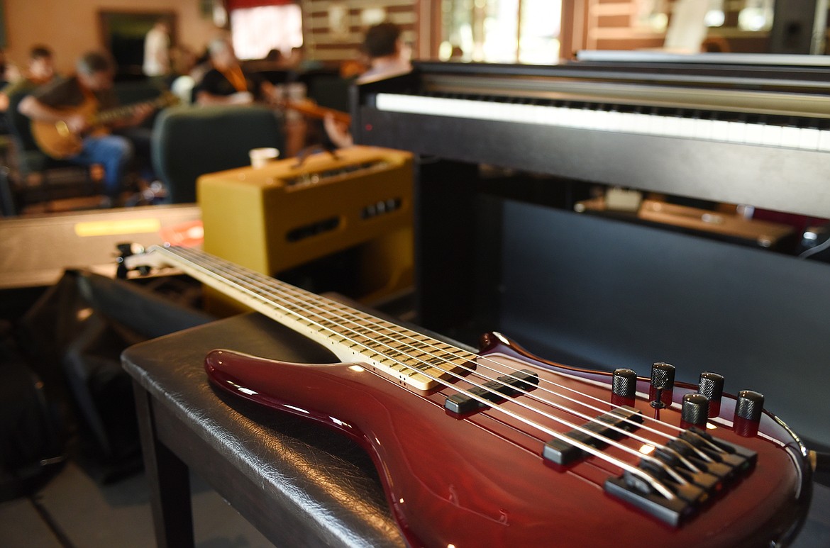 Detail of an electric guitar plugged in and waiting to be used in the Excel with the Masters class on Monday morning, August 29, at the Seventh Annual Crown Guitar Workshop at the Flathead Lake Lodge.(Brenda Ahearn/Daily Inter Lake)