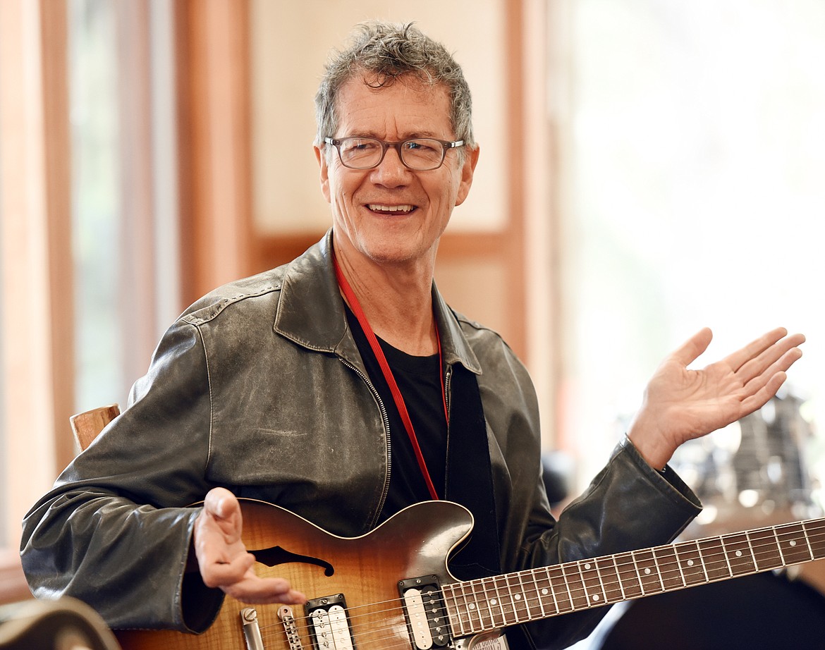 Jon Herington talks with students in the Beyond Blues class as they prepare to break for lunch on Monday morning, August 29, at the Seventh Annual Crown Guitar Workshop at the Flathead Lake Lodge.(Brenda Ahearn/Daily Inter Lake)