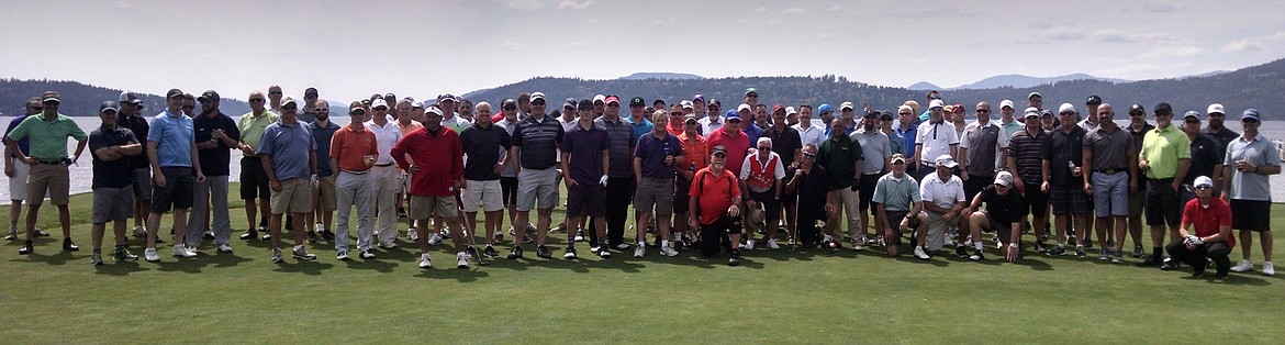 &#151;Courtesy photo
The Hidden Lakes Orphans will celebrate their 10th Anniversary Reunion on Saturday, Sept. 24 at 10 a.m. at the Idaho Club. The price is $75, which includes greens fee and a cart, and is open any and all area men, women and youth golfers. There will be a skins game for anyone interested. Call the Idaho Club at 265-2345 to register asap. Earlier this season, more than 100 men (pictured above) turned out for the 10th Anniversary of the Annual Golf Excursion at Circling Raven and the Coeur d&#146;Alene Resort Golf Course. The winning team was comprised of Mark Lawrence, Matt Sharp, Jesse Gold and Cam Burchette, while the top three low individuals were James Mize, Todd Vorhies and Lawrence. Closest to the pin winners included Eric Hern, Rhys Sandaker, Cam Burchette, Satini Puailoa, Mark Lawrence, Nelson Ferrick, Lee Verment, Todd Vorhies and Dave Reseska.